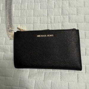 Sold!Michael Kors Black Wallet with Gold Accents